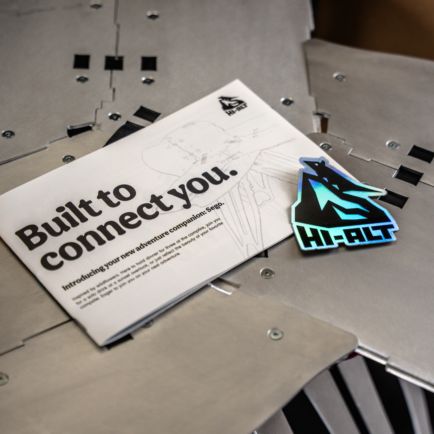 Sego user manual and holographic sticker detail.
