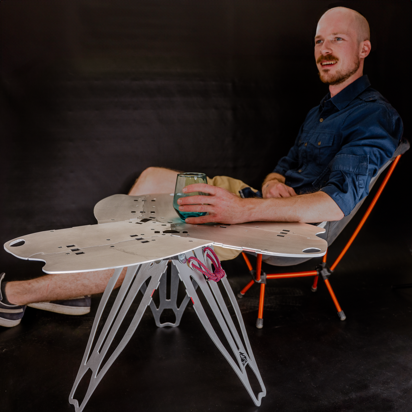 Sego side table with person for scale